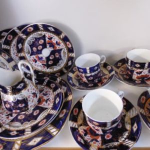 Tea Set - 6 cups, saucers, side plates, milk jug, cake plate.